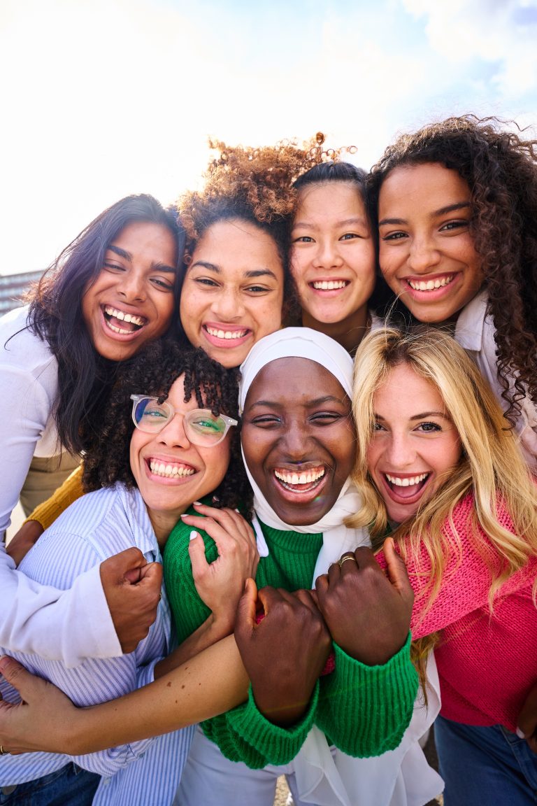 Vertical,Of,Group,Of,Beautiful,Young,Multiracial,Girl,Friends,Community